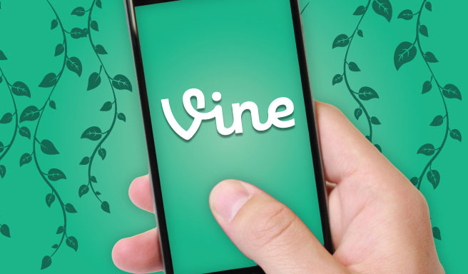 hand holding phone with vine text inside